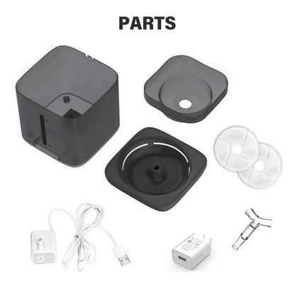 Partes de la fuente de agua automática para gatos y perros con dos filtros y adaptador de corriente.